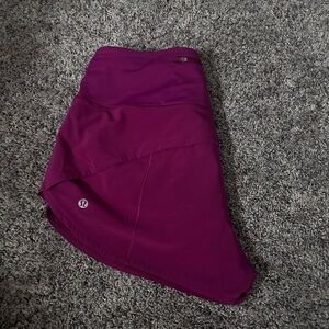 Lululemon high rise speed up shorts 
2.5in inseam 
color: pomegranate 
size: 8